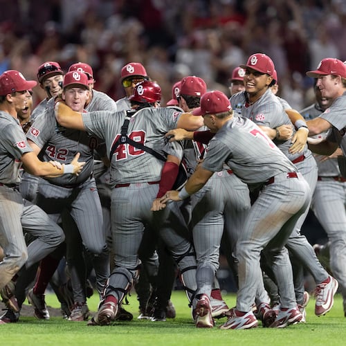 Oklahoma players celebrate after defeating North Carolina in Game 3 of the NCAA College World Series baseball finals in Omaha, Neb., Monday, June 22, 2026. (AP Photo/Rebecca S. Gratz)
