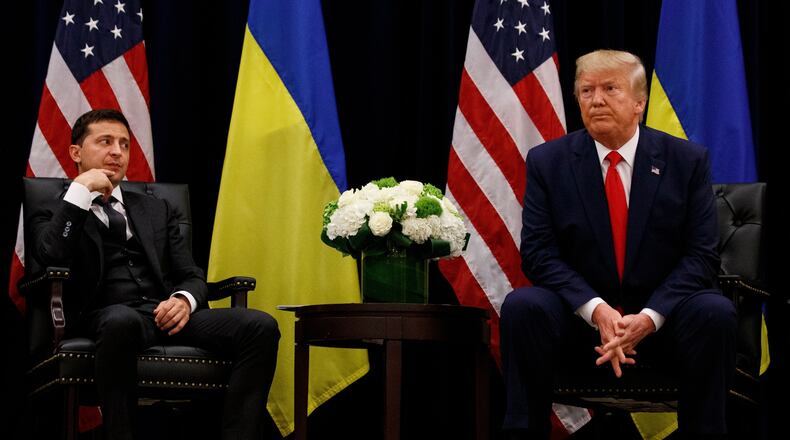 FILE - In this file photo taken Sept. 25, 2019, U.S. President Donald Trump meets with Ukrainian President Volodymyr Zelenskiy at the InterContinental Barclay New York hotel during the United Nations General Assembly, in New York. (AP Photo/Evan Vucci, File)