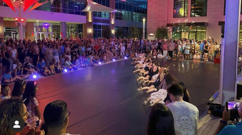 A dance performance takes place on the plaza stage at Camperdown, a mixed-use development with a big entertainment component in downtown Greenville, S.C. (Courtesy of Camperdown)
