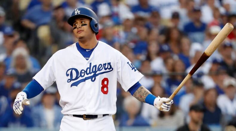 Manny Machado split his 2018 season between the Los Angeles Dodgers and the Baltimore Orioles.