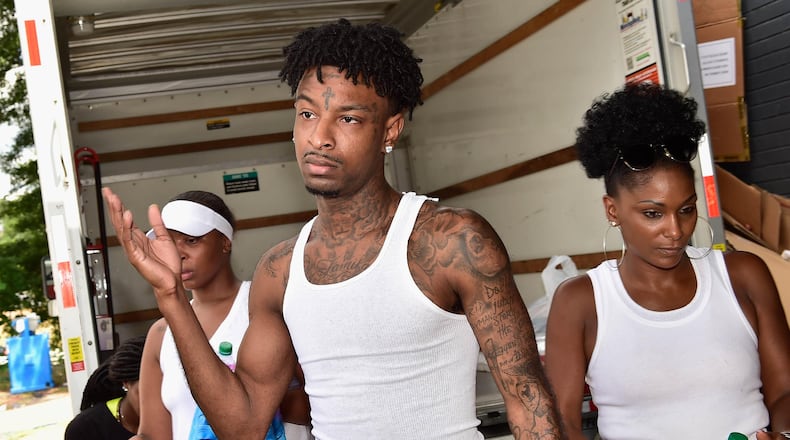 21 Savage and his mom, Heather, at his "Issa Back 2 School Drive" in Atlanta on Sunday. Photo: Moses Robinson/Getty Images for Leading By Example Foundation