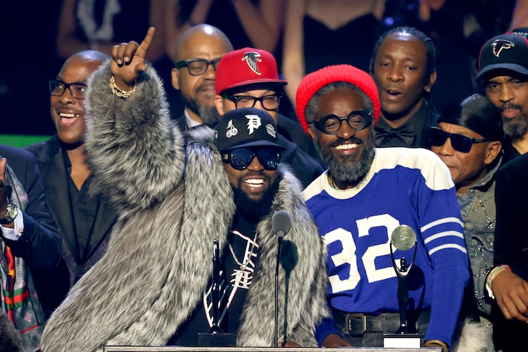Inductees Big Boi and André 3000 of Outkast speak onstage during the 2025 Rock & Roll Hall of Fame Induction Ceremony at Peacock Theater on November 08, 2025 in Los Angeles, California. (Photo by Kevin Kane/Getty Images for RRHOF)