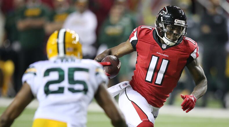 Julio Jones has been a difference maker for the Falcons but he would be in Atlanta if Cleveland didn't trade their first-round draft pick to them in 2011. (Curtis Compton/ccompton@ajc.com)