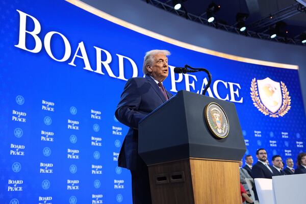 President Donald Trump spoke during a Board of Peace charter announcement at the World Economic Forum in Switzerland. (Evan Vucci/AP)