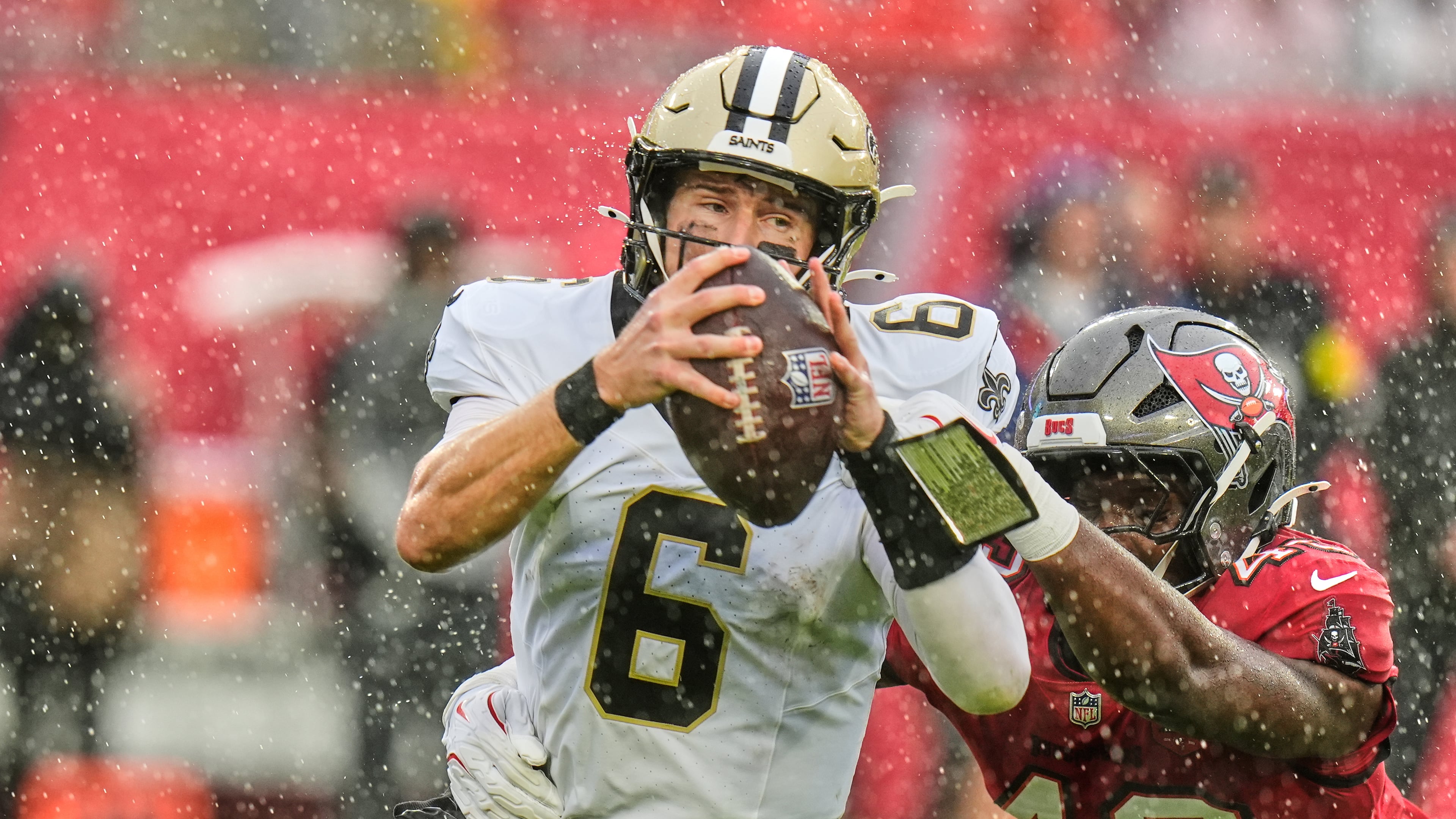 New Orleans Saints quarterback Tyler Shough (6) is sacked by Tampa Bay Buccaneers linebacker Chris Braswell (43) in the first half of an NFL football game, Sunday, Dec. 7, 2025, in Tampa, Fla. (AP Photo/Chris O'Meara)