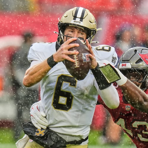 New Orleans Saints quarterback Tyler Shough (6) is sacked by Tampa Bay Buccaneers linebacker Chris Braswell (43) in the first half of an NFL football game, Sunday, Dec. 7, 2025, in Tampa, Fla. (AP Photo/Chris O'Meara)