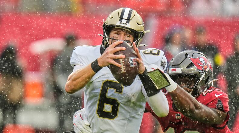 New Orleans Saints quarterback Tyler Shough (6) is sacked by Tampa Bay Buccaneers linebacker Chris Braswell (43) in the first half of an NFL football game, Sunday, Dec. 7, 2025, in Tampa, Fla. (AP Photo/Chris O'Meara)