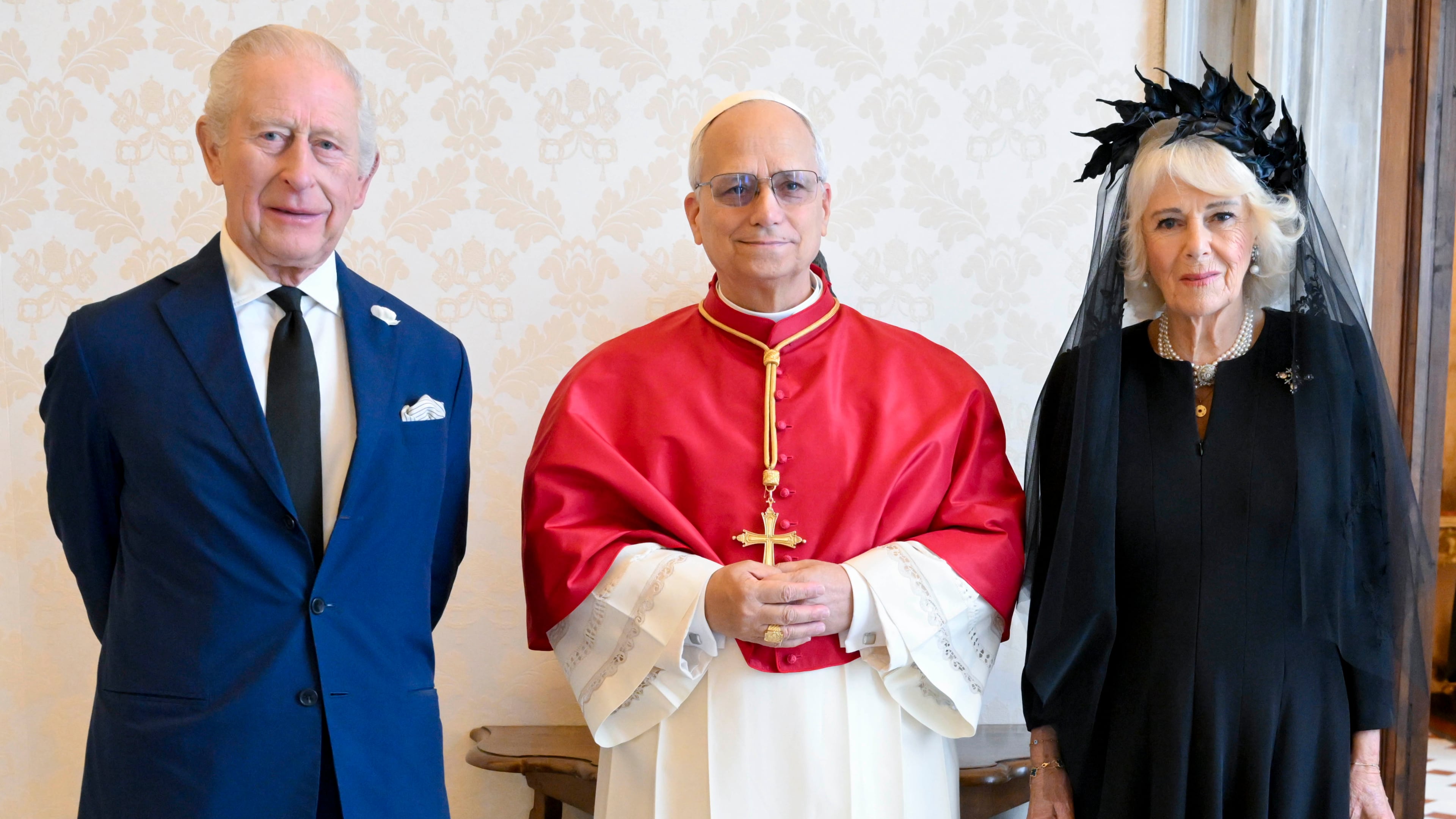 In this picture made available by Vatican Media, Britain's King Charles III and Queen Camilla pose with Pope Leo XIV as they meet at the Vatican during a state visit, Thursday, Oct. 23, 2025. (Vatican Media via AP, HO)
