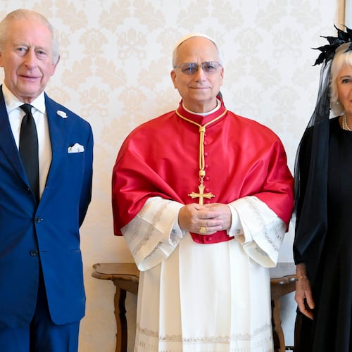 In this picture made available by Vatican Media, Britain's King Charles III and Queen Camilla pose with Pope Leo XIV as they meet at the Vatican during a state visit, Thursday, Oct. 23, 2025. (Vatican Media via AP, HO)