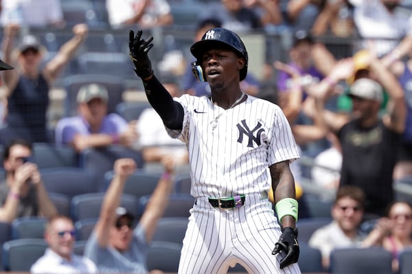New York Yankees' Jazz Chisholm Jr. reacts after hitting a three-run scoring triple during the third inning of a baseball game against the Athletics, Sunday, June 29, 2025, in New York. (AP Photo/Adam Hunger)