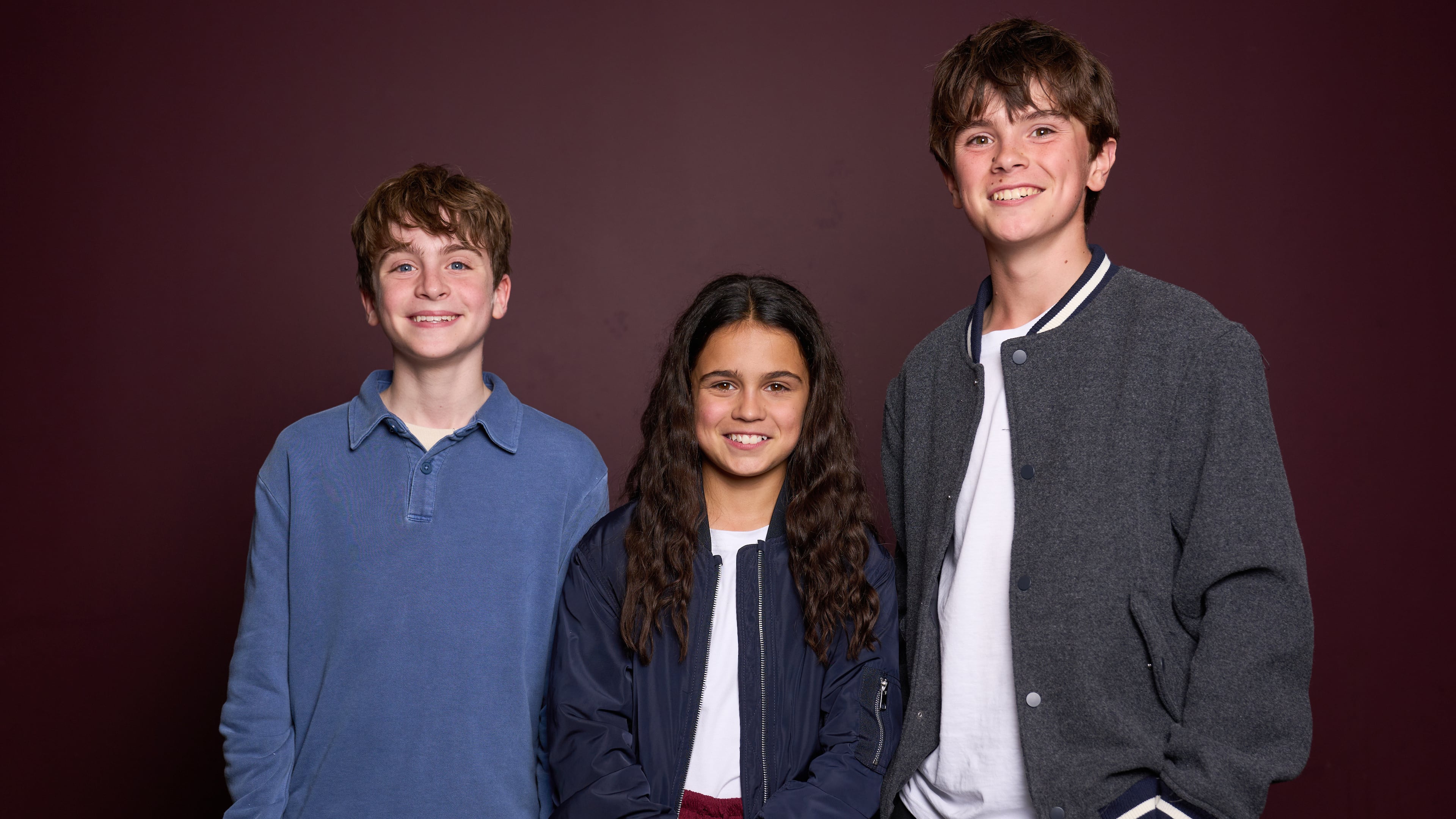 Max Lester, from left, Arabella Stanton and Frankie Treadaway pose for a portrait to promote the Audible "Harry Potter" series in London on July 20, 2025. (Photo by Scott A Garfitt/Invision/AP)