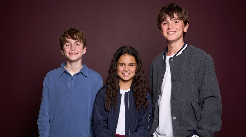 Max Lester, from left, Arabella Stanton and Frankie Treadaway pose for a portrait to promote the Audible "Harry Potter" series in London on July 20, 2025. (Photo by Scott A Garfitt/Invision/AP)