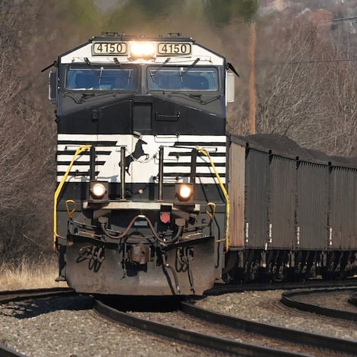 FILE - A Norfolk Southern freight train passes through Homestead, Pa., March 12, 2025. (AP Photo/Gene J. Puskar, File)