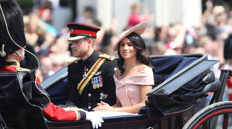 Prince Harry and Meghan Markle ride to Buckingham Palace on Saturday for the annual Trooping of the Colour.