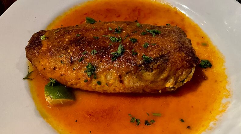 Agave's beef and poblano chile relleno appears in the menu’s appetizer section, but it can make a hearty meal. Angela Hansberger for The Atlanta Journal-Constitution