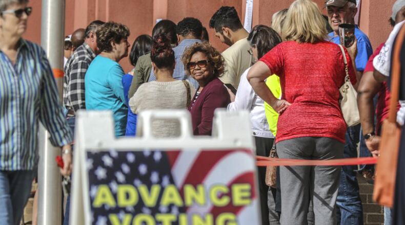 People lined up for early voting at the Cobb County West Park Government Center in Marietta, Georgia, on Oct. 18, 2018.