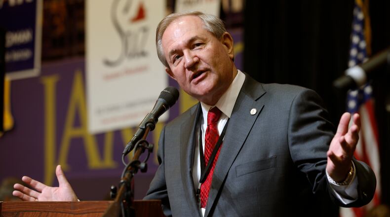 Former Virginia Gov. Jim Gilmore gestures as he addresses the Virginia State Republican Convention in Harrisonburg, Va., Saturday, April 30, 2016. Republican party insiders are gathering to pick 16 delegates for the national presidential convention. (AP Photo/Steve Helber)