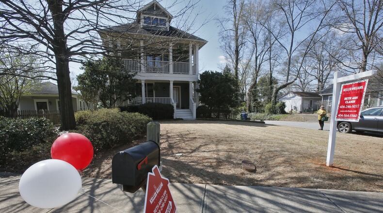 Real estate broker Debbie Jones Kelly (far right) visited several homes on Tuesday’s Agent Open House tour in Atlanta. This house, listed at $305,000, went on the market last week, was already under contract and had received multiple offers. Metro Atlanta home prices rose 16.8 percent year-over-year in January, according to the S&P Case-Shiller Home Price Index. It is the 14th straight month of double-digit price increases, but the price increases have been moderating since last April. Then, the year-over-year increase was 20.8 percent. In the 20 cities the index tracks, prices were up 13.2 percent in January. BOB ANDRES / BANDRES@AJC.COM
