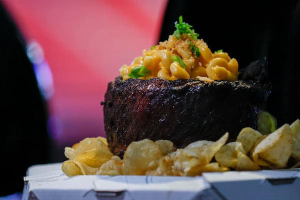 The Stadium Rack-O-Ribs, which will be available for a limited time at several concessions around the stadium, is served with macaroni and cheese, Ritz cracker crumbs, green onions and kettle chips. (Miguel Martinez/AJC)