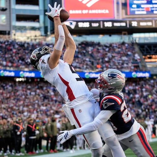 Atlanta Falcons wide receiver Drake London makes a touchdown catch against New England Patriots cornerback Marcus Jones during the first half of an NFL football game, Sunday, Nov. 2, 2025, in Foxborough, Mass. The Patriots defeated the Falcons 24-23. (Robert F. Bukaty/AP)