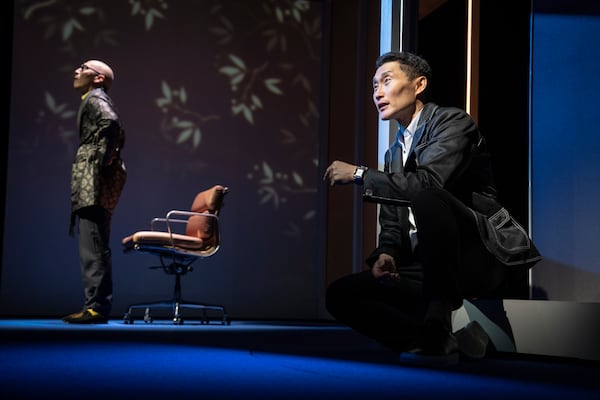 This image released by Polk & Co. shows Francis Jue, left, and Daniel Dae Kim during a performance of "Yellow Face on Broadway," a play by David Henry Hwang, in New York. (Joan Marcus/Polk & Co. via AP)