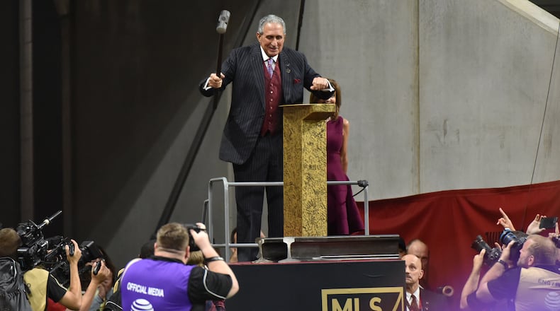 August 1, 2018 Atlanta - Arthur Blank hammers before the Major League Soccer All-Star Game between MLS All-Stars and Juventus at the Mercedes-Benz Stadium on Wednesday, August 1, 2018. HYOSUB SHIN / HSHIN@AJC.COM