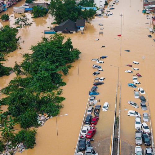 FILE - Cars and houses are submerged in floodwaters in the Songkhla province of southern Thailand, Nov. 26, 2025. (AP Photo/Arnun Chonmahatrakool, File)