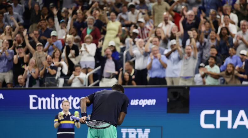 Gael Monfils, of France, takes a bow after winning a point against Adolfo Daniel Vallejo, of Paraguay, during the first round of the U.S. Open tennis championships Tuesday, Sept. 1, 2026, in New York. (AP Photo/Adam Hunger)