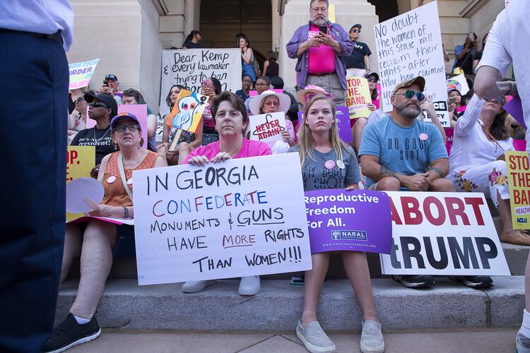 Abortion rights supporters gather on the steps of the state Capitol during a rally in May 2019. (Alyssa Pointer/AJC)