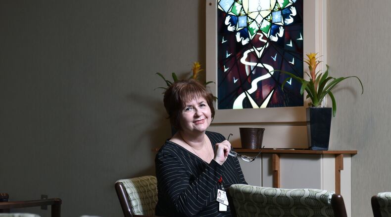 As a hospital chaplain, Laurie Eynon conforts those seeking support and spiritual guidance at Northside Hospital. HYOSUB SHIN / HSHIN@AJC.COM