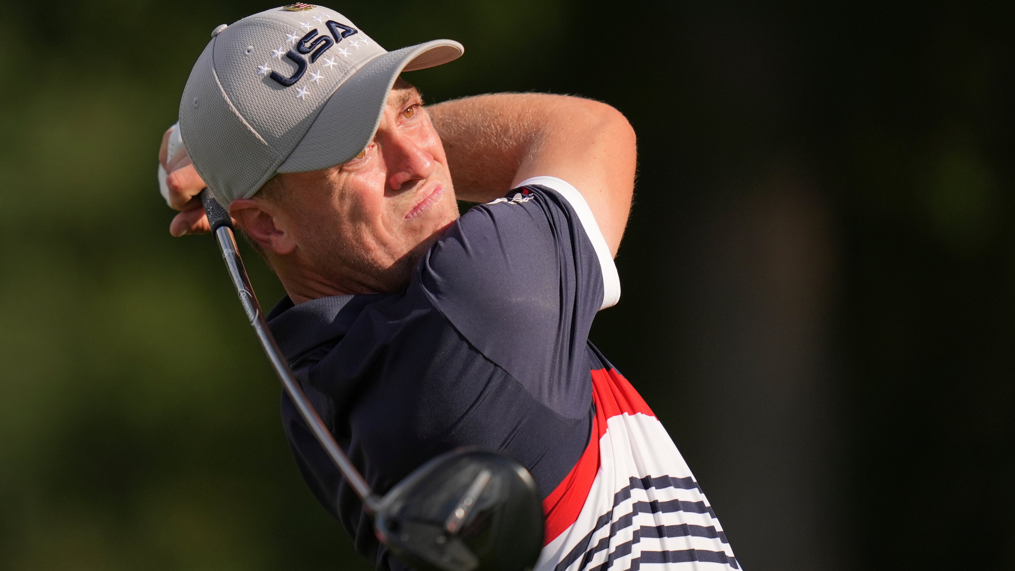 FILE - United States' Justin Thomas watches his tee shot on the 12th hole at Bethpage Black golf course during the Ryder Cup golf tournament, Friday, Sept. 26, 2025, in Farmingdale, N.Y. (AP Photo/Seth Wenig, File)