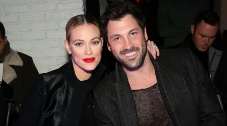 NEW YORK, NY - FEBRUARY 09: Peta Murgatroyd (L) and Maksim Chmerkovskiy attend the VALENTINNICOLE fashion show during New York Fashion Week at Lovage on February 9, 2017 in New York City. (Photo by Monica Schipper/Getty Images)