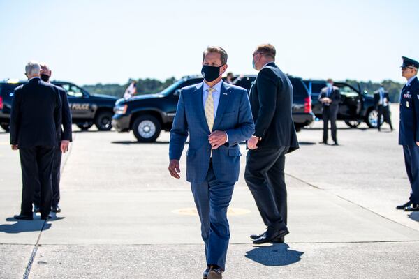 In this file photo, here is Georgia Gov. Brian Kemp after greeting Vice President Mike Pence at Dobbins Air Reserve Base in Marietta. (Alyssa Pointer / Alyssa.Pointer@ajc.com)