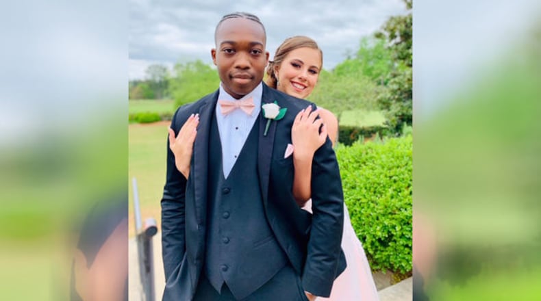 Chase McDaniel, 17, posed with his date for a prom photo. The teen died after battling cancer.