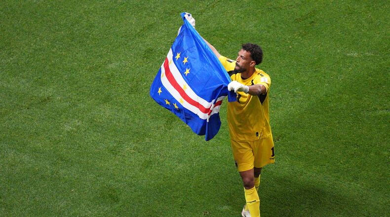 Cape Verde goalkeeper Vozinha (1) waves a flag for fans after a 0-0 draw during the World Cup Group H soccer match between Spain and Cape Verde in Atlanta, Monday, June 15, 2026. (AP Photo/Jacob Kupferman)