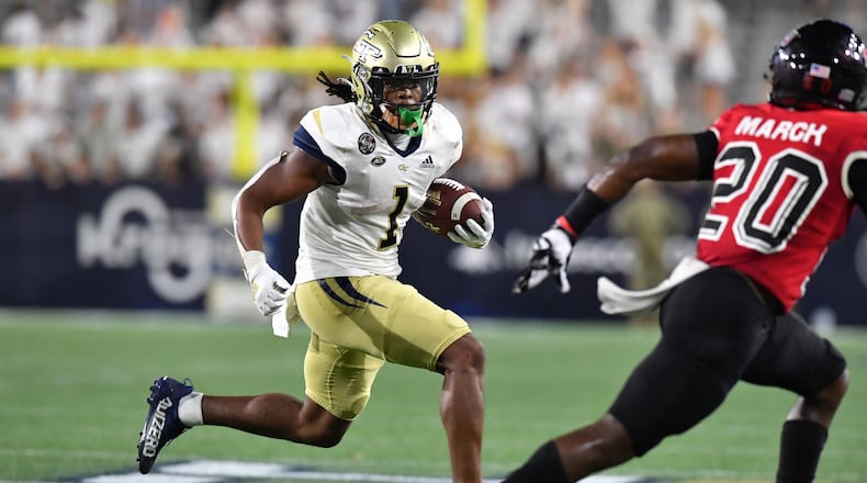 Georgia Tech's Jahmyr Gibbs (1) runs with a ball during the second half of an NCAA college football game at Georgia Tech's Bobby Dodd Stadium in Atlanta on Saturday, September 4, 2021.