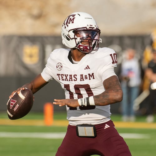 Texas A&M quarterback Marcel Reed looks to throw a pass during the first half an NCAA college football game against Missouri, Saturday, Nov. 8, 2025, in Columbia, Mo. (AP Photo/L.G. Patterson)