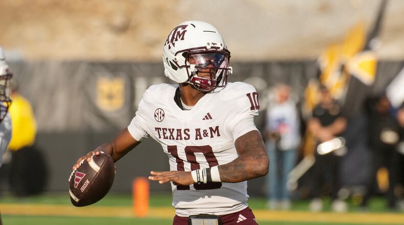 Texas A&M quarterback Marcel Reed looks to throw a pass during the first half an NCAA college football game against Missouri, Saturday, Nov. 8, 2025, in Columbia, Mo. (AP Photo/L.G. Patterson)