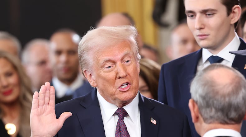 Donald Trump takes his oath of office during the presidential inauguration at the U.S. Capitol Rotunda in Washington on Jan. 20, 2025. (Kevin Lamarque/CNP via Zuma Press Wire/TNS)