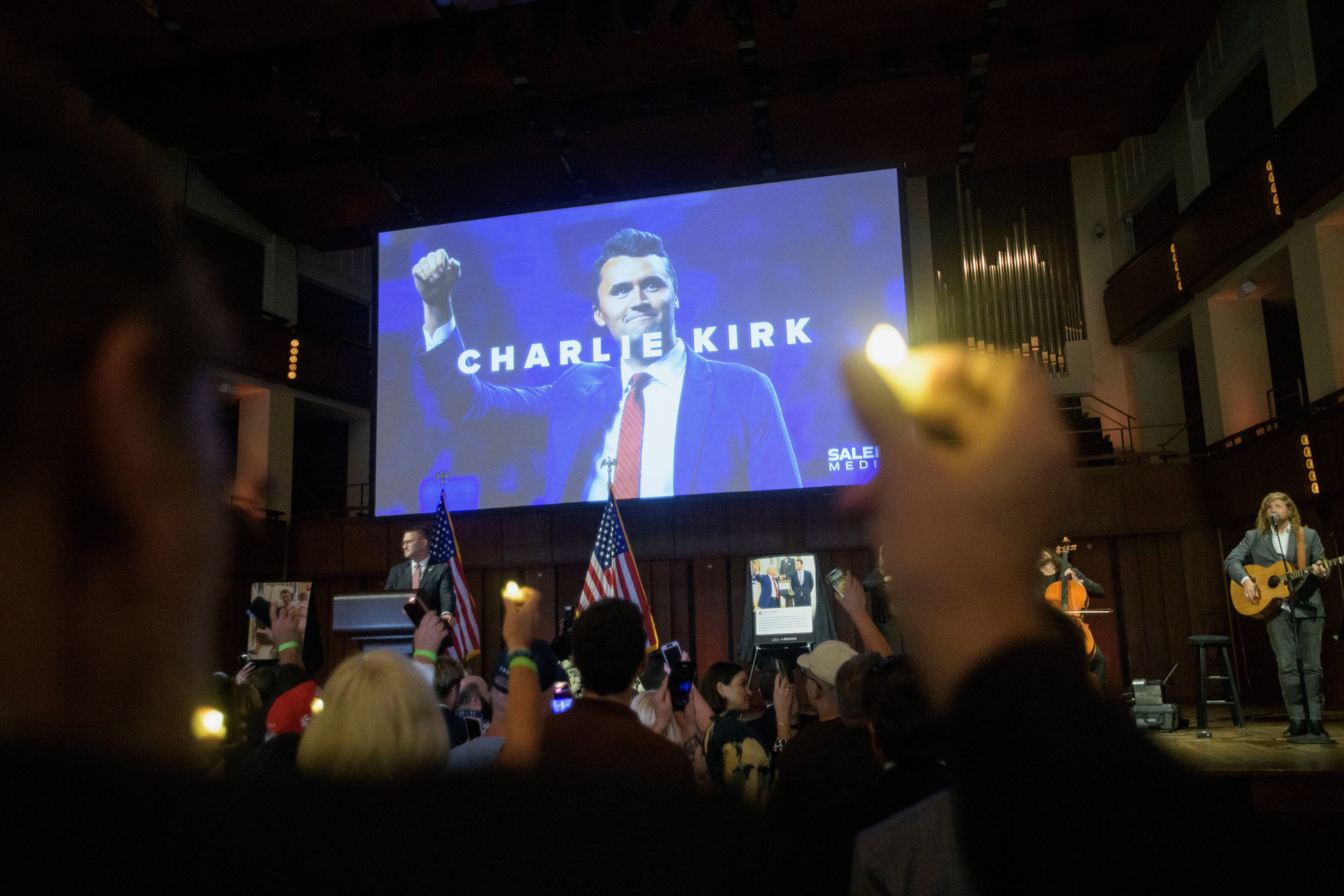 Mourners hold candles during a prayer vigil for Charlie Kirk in Washington, D.C., on Sunday.