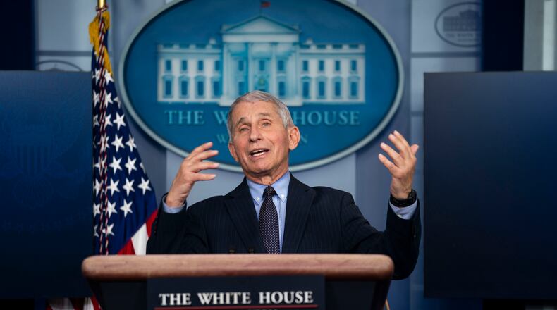 Dr. Anthony Fauci, director of the National Institute of Allergy and Infectious Diseases, addresses reporters about the coronavirus pandemic during a briefing at the White House in Washington on Thursday, Jan. 21, 2021. A day after President Biden reinstated American ties with the World Health Organization, Dr. Fauci told the organization that the United States was committed to working closely with other nations to implement a more effective global response to the pandemic. (Doug Mills/The New York Times)