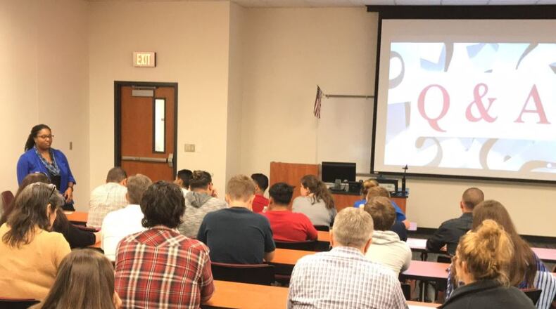 Gabrielle McCormick speaks to parents and students about how her company, Scholarship Informer, can help find funding to pay for college. (HANDOUT PHOTO)