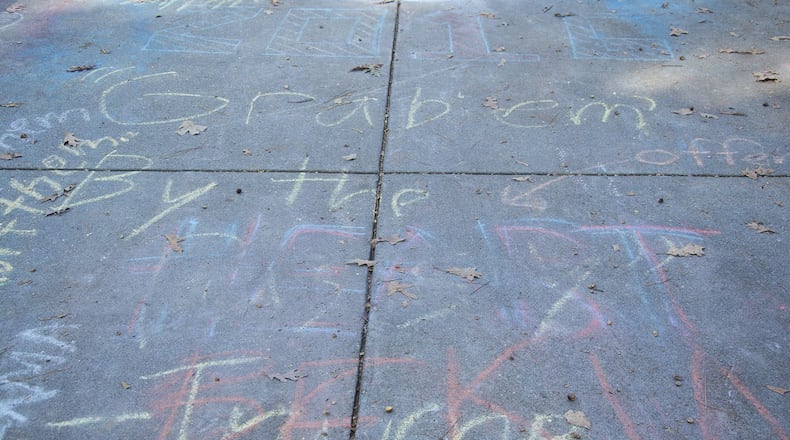 A chalk writing on the Berry College campus of an offensive statement by Republican presidential candidate Donald Trump has been covered by some students with other words, officials said. Photo courtesy of Berry College.