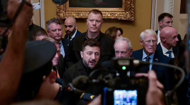 Ukraine's President Volodymyr Zelenskyy, center, speaks to reporters at the U.S. Capitol with from left: Sen. Richard Blumenthal, D-Conn., Sen. James Risch, R-Idaho, Sen. Roger Wicker, R-Miss., and Sen. Mark Kelly, D-Ariz., following a meeting of bipartisan leaders of the Lindsey O. Graham Sanctioning Russia and Iran Act of 2026, Tuesday, July 28, 2026, in Washington. (AP Photo/Rod Lamkey, Jr.)