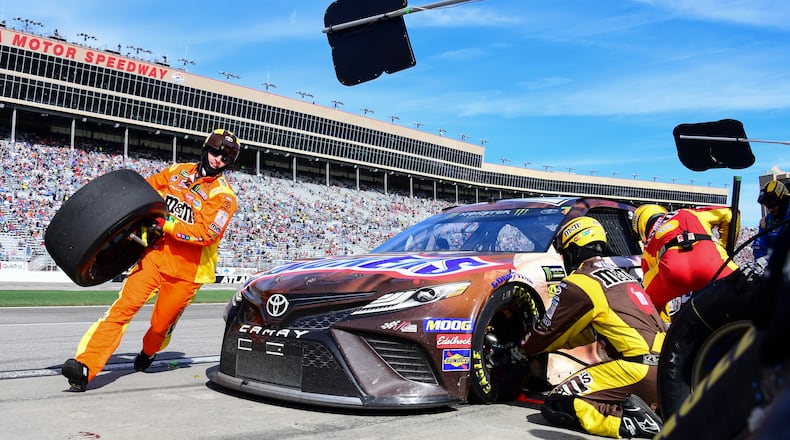 Minus all the fans in the background, racing is scheduled to resume this weekend at Atlanta Motor Speedway. (AP Photo/Scott Cunningham)