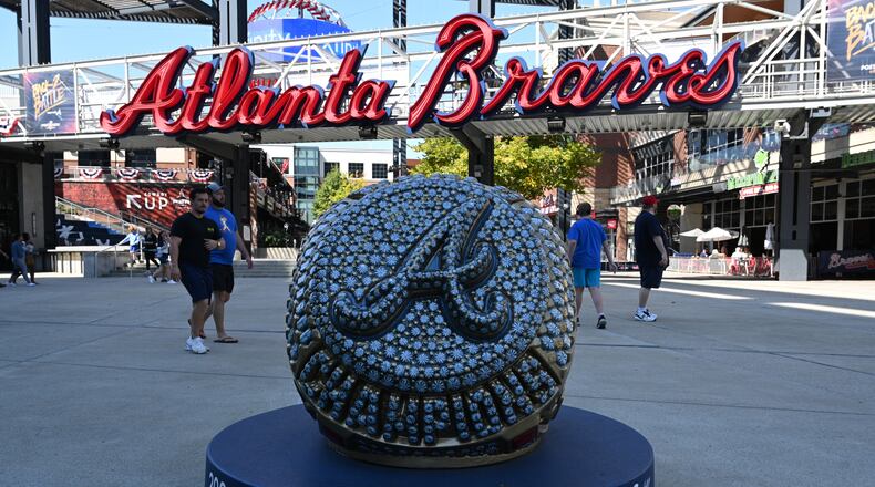Baseball fans are seen during lunch hours at The Battery Atlanta prior to National League Division Series (NLDS) starting next Tuesday at Truist Park on Friday, Oct. 7, 2022. (Hyosub Shin / Hyosub.Shin@ajc.com)