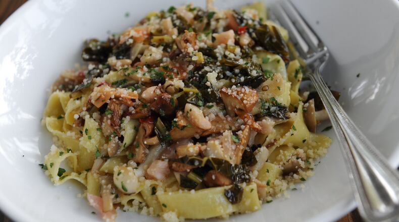 Boccalupo’s 20-yolk tagliatelle is served with wild mushrooms, Tuscan kale kimchee and butter. (BECKY STEIN)
