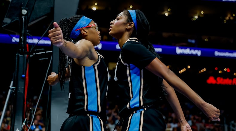 Atlanta Dream forward Angel Reese (right) reacts with guard Allisha Gray during the first half of a game between the Dream and the Indiana Fever, Sunday, Aug. 16, 2026, in Atlanta. "Everybody just comes in with a lot of confidence," Reese says. (Erik S. Lesser for the AJC)