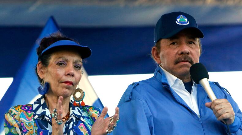 FILE - President Daniel Ortega and his wife, Vice President Rosario Murillo, lead a rally in Managua, Nicaragua, Sept. 5, 2018. (AP Photo/Alfredo Zuniga, File)