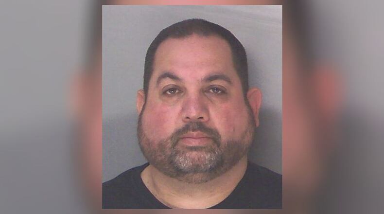 Ariel Vera-Gonzalez, a corporal with the Fulton County Marshal's Department, faces child molestation and aggravated sexual battery charges in Douglas County.